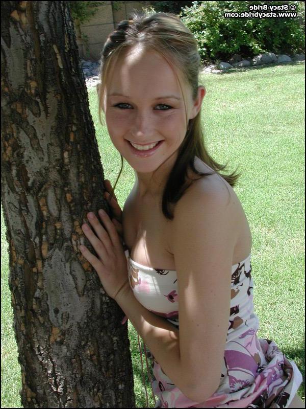 20P Pictures of Stacy Bride getting naked outside
