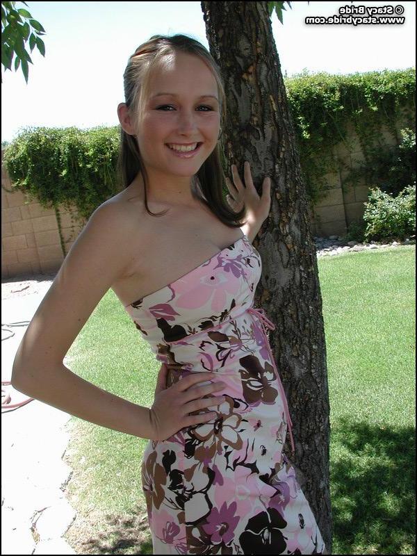20P Pictures of Stacy Bride getting naked outside