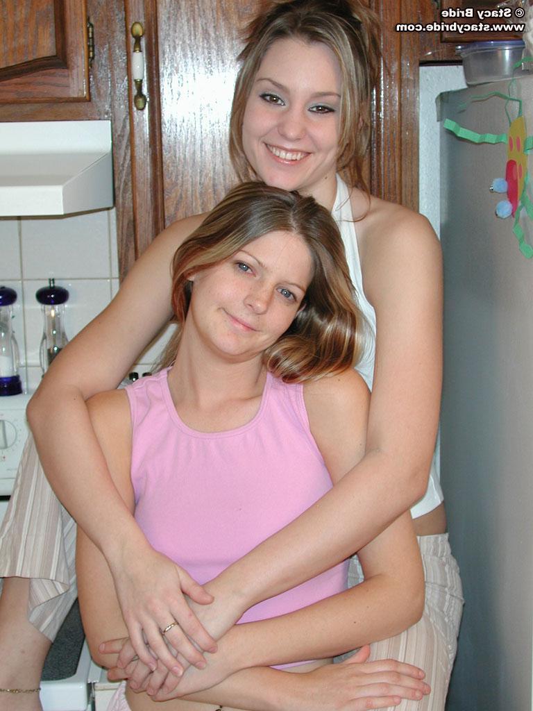 20P Three hot teen girls get naked in the kitchen