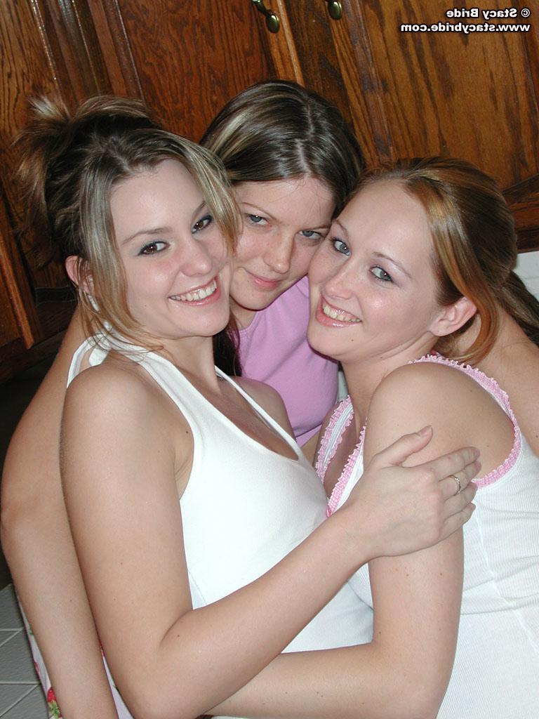 20P Three hot teen girls get naked in the kitchen