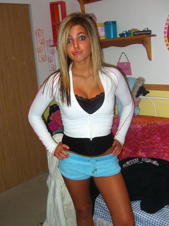 12P Cute girls with cell phones taking self photos