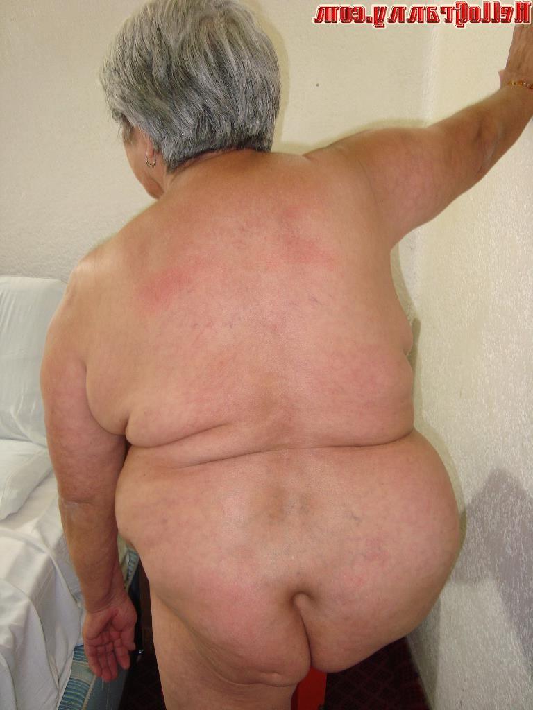 15P Nice granny licks her tits and makes striptease