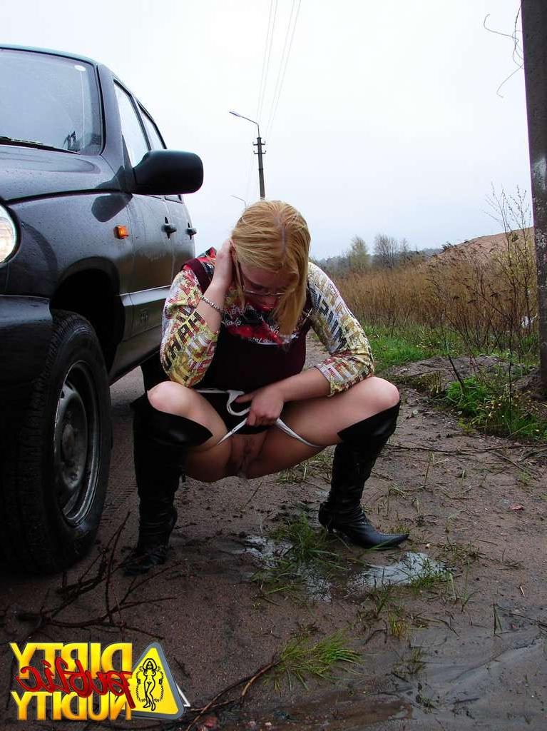 15P Luba pissing on the road