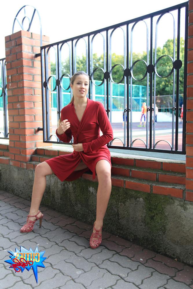 16P Young tart showing her tight body off in public