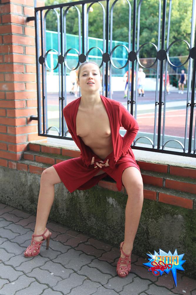 16P Young tart showing her tight body off in public