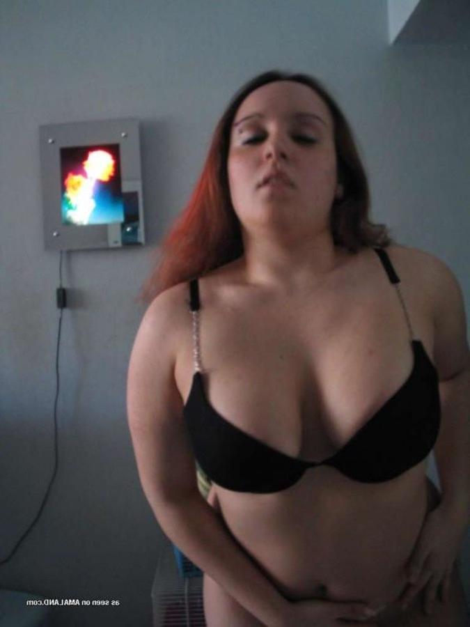 8P Gallery of a naughty chubby chick flashing her huge breasts