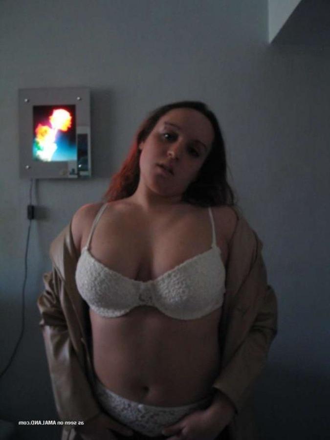 8P Gallery of a naughty chubby chick flashing her huge breasts