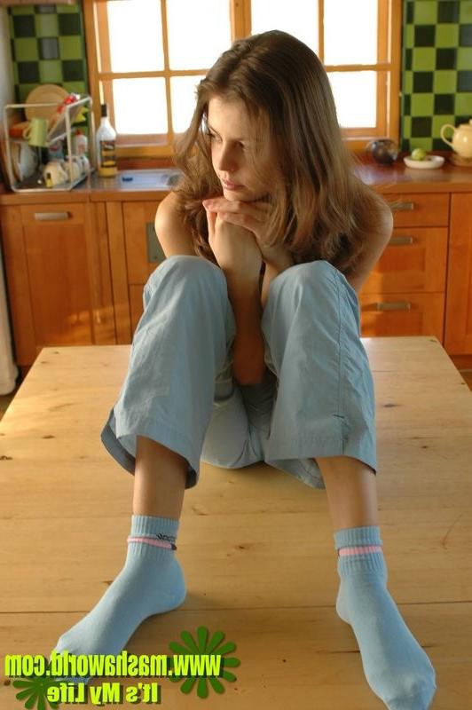 15P Beautiful young model stripping