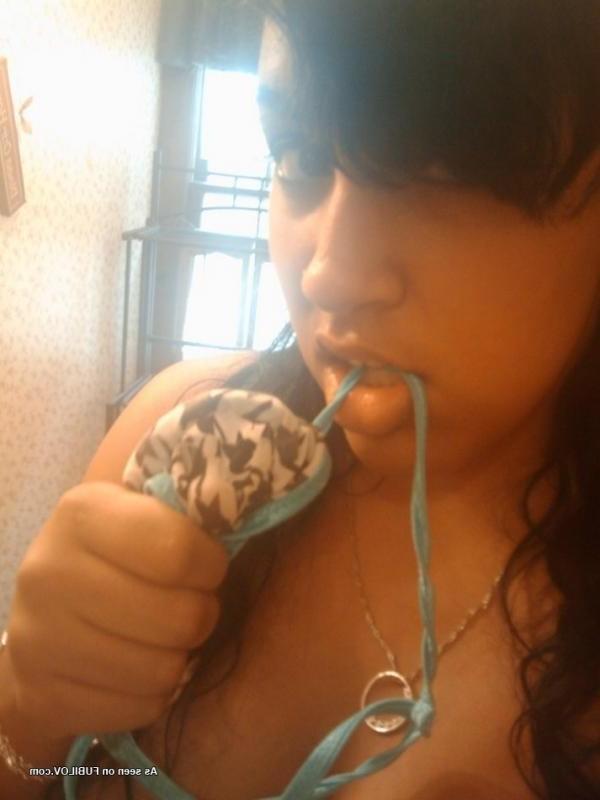14P Curvy Latina babe shows off her pierced pussy