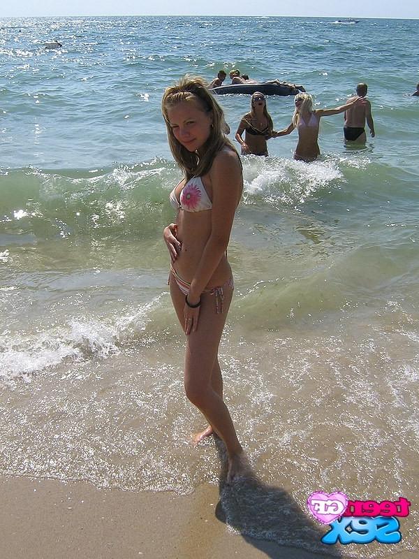12P Young bikini girls demonstrating the topless view