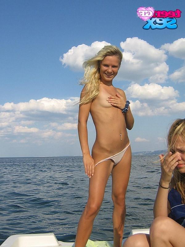 12P Young bikini girls demonstrating the topless view