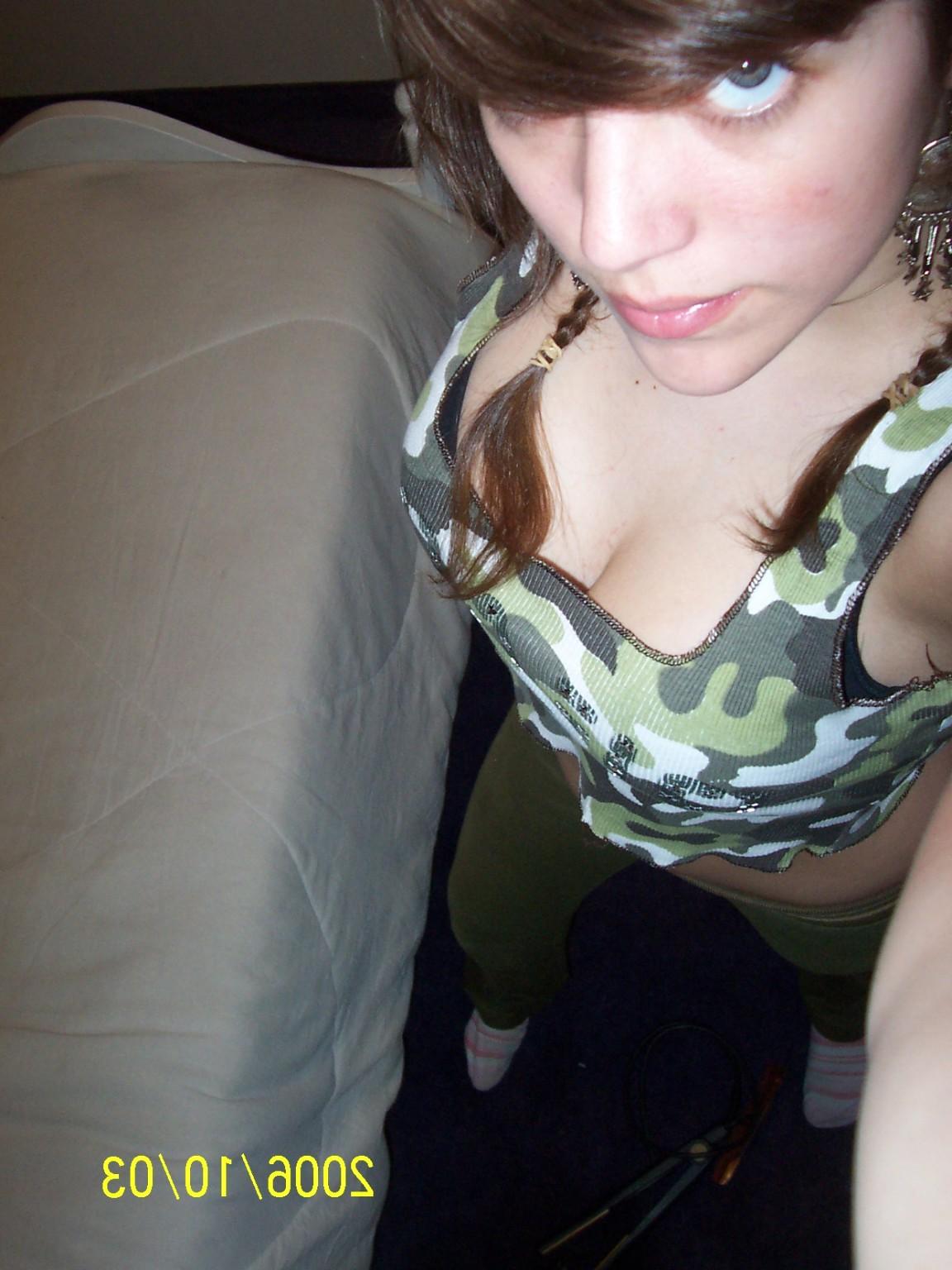 15P Horny bitch showing her tits