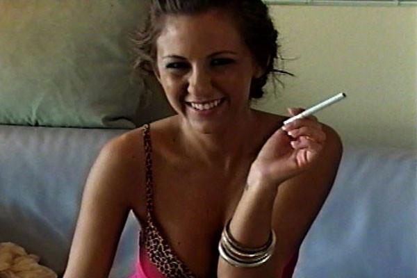 15P A heavenly honey shows off her goodies while taking long drags of nicotine.