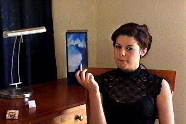 15P Latina lovely puffs away as she throws you a come-hither glance
