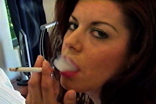 15P Latina lovely puffs away as she throws you a come-hither glance