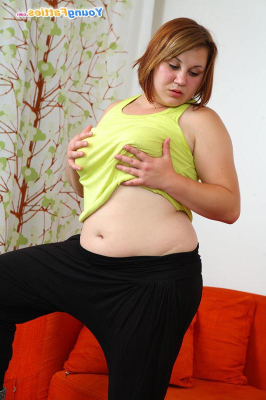 16P Sporty young fatty doesn't mind baring her melons