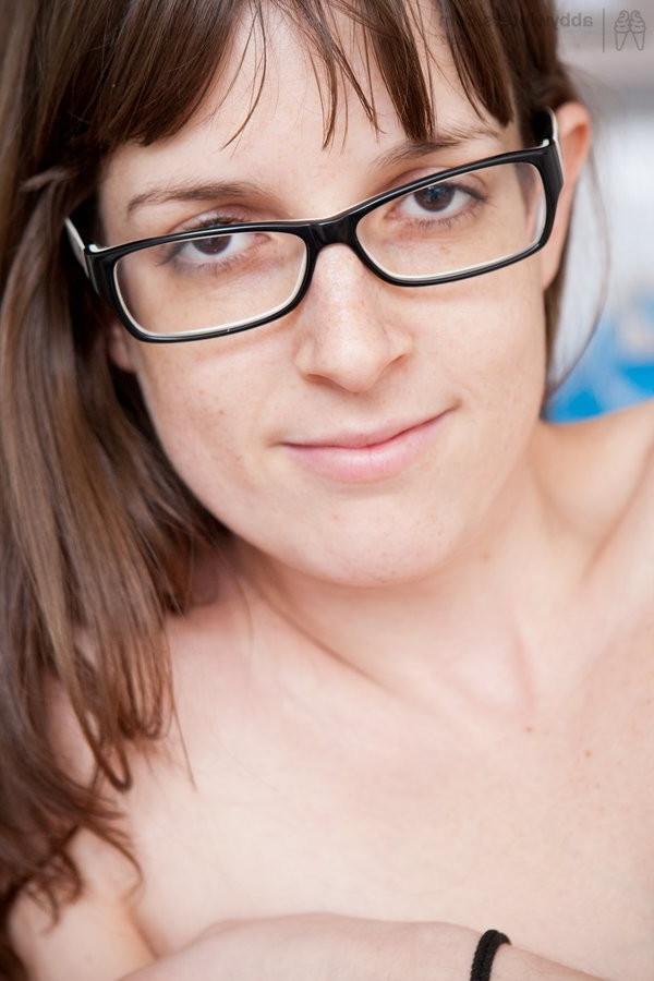 15P Sexy Amateur Babe In Glasses And Striped Stockings