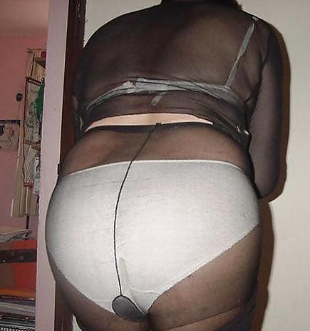 14P Female ass in underwear and pantyhose.