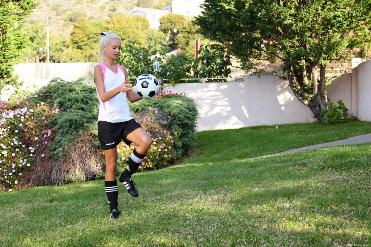 16P Thin teen blonde soccer girl outdoors