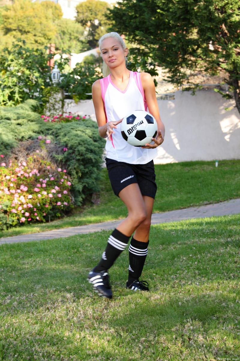 16P Thin teen blonde soccer girl outdoors