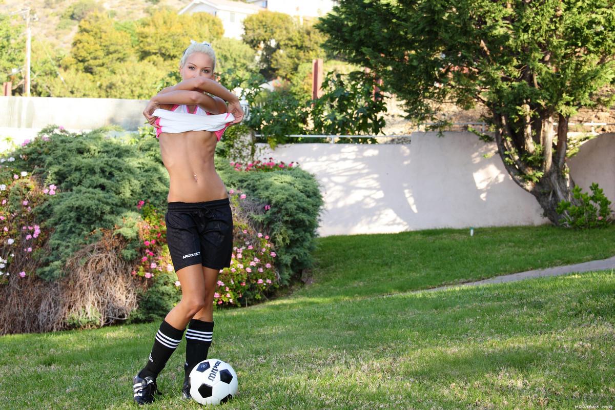 16P Thin teen blonde soccer girl outdoors
