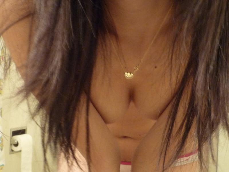 10P Naughty chick teasing on cam by flashing her tits and ass