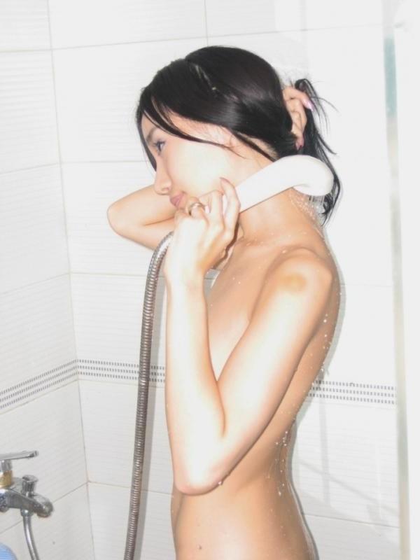 15P Two naughty Asian chicks teasing and posing naked