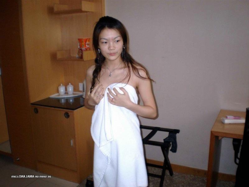 15P Picture selection of a sexy Asian babe taking a shower