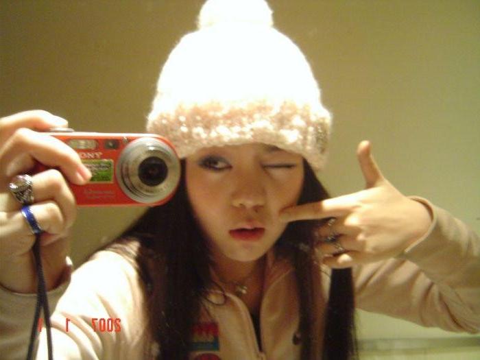 18P Wild cutie strips out of winter clothes and takes selfpics