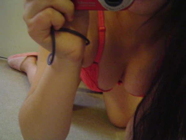 18P Wild cutie strips out of winter clothes and takes selfpics