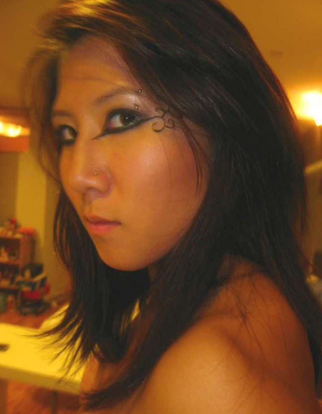 14P Pictures of an amateur Oriental sex kitten