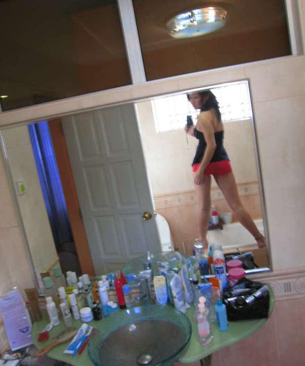 14P Pictures of an amateur Oriental sex kitten