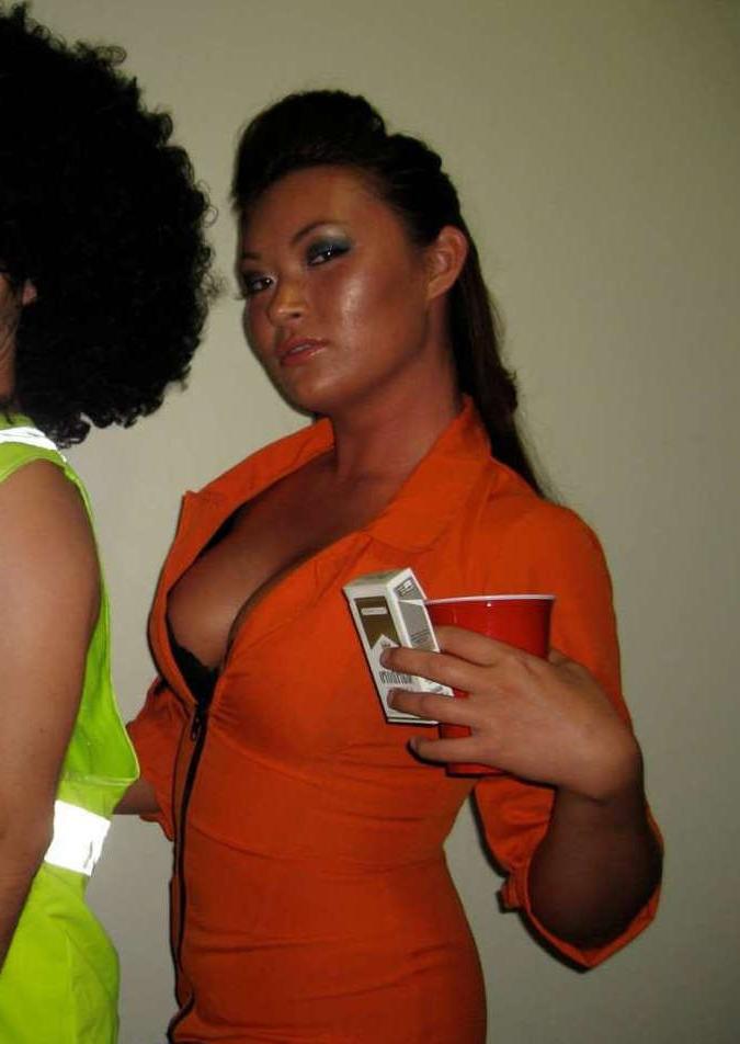 15P Pictures of an Oriental tease posing sexy in a party