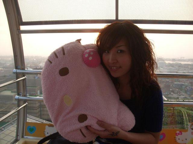 16P Innocent teen stripping on a Hello Kitty ferris wheel