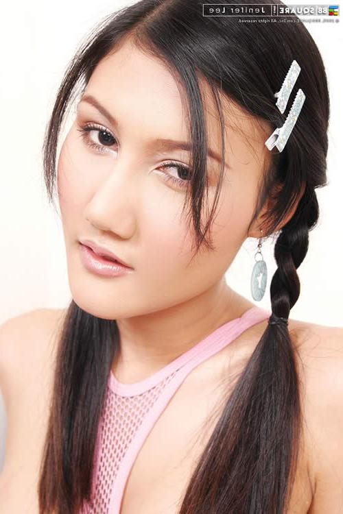 15P Asian cutie posing in boxing gloves