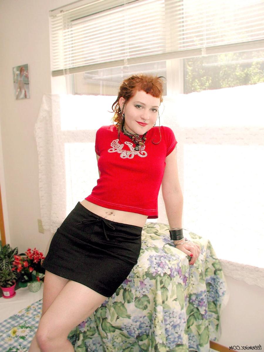 19P Cute punkish redhead teen in a skirt spreading her tight ass