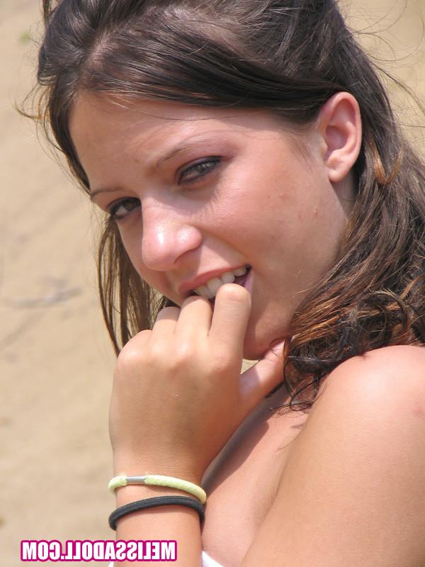 16P hot teen pulls her shorts aside to show off pussy