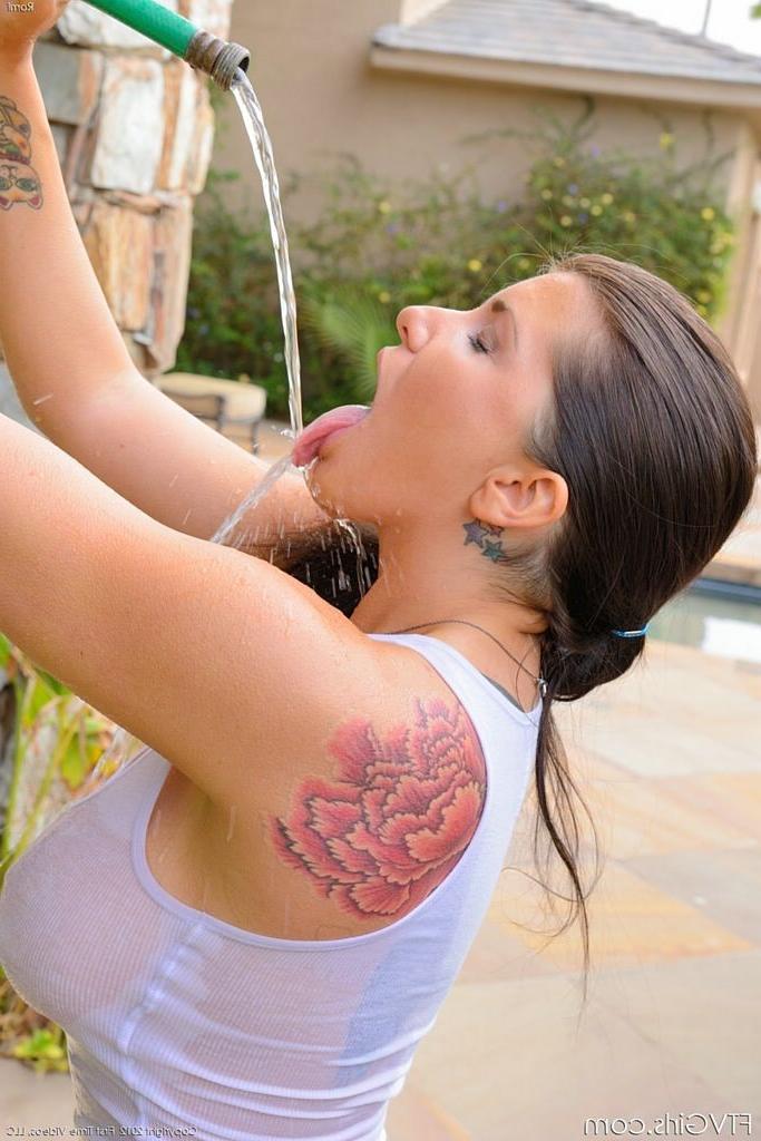 15P Romi Rain squirts water out of her pussy with hose