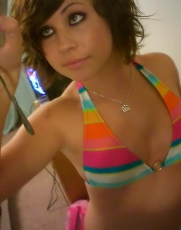 12P Gorgeous cute teen with big tits posing on camera