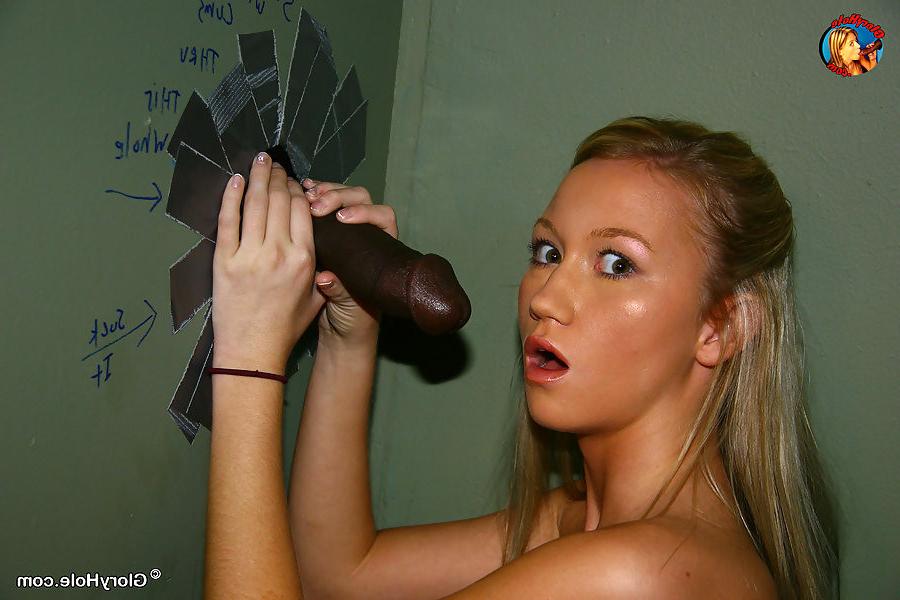 18P Madison Scott sucking off a massive black cock at a glory hole
