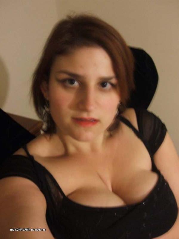 15P Chubby Latina spread on the floor in black lingerie