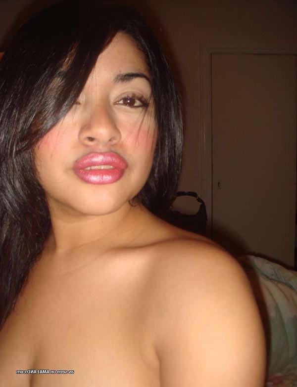 15P Gorgeous Latina teasing with her big tits