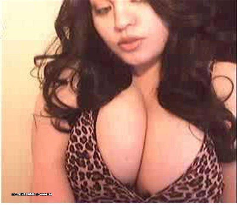 15P Dark-haired hottie teasing with her bouncy tits