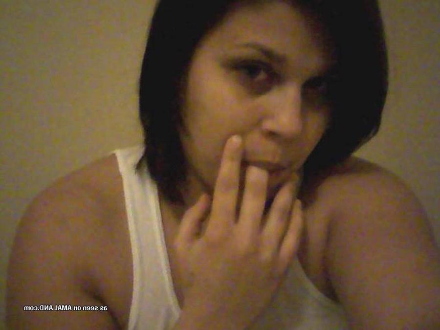 16P Close-up of busty Latina strokes her pussy