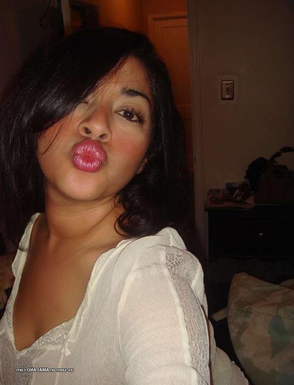 15P Gorgeous Latina teasing with her big tits