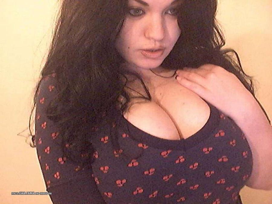 15P Dark-haired hottie teasing with her bouncy tits