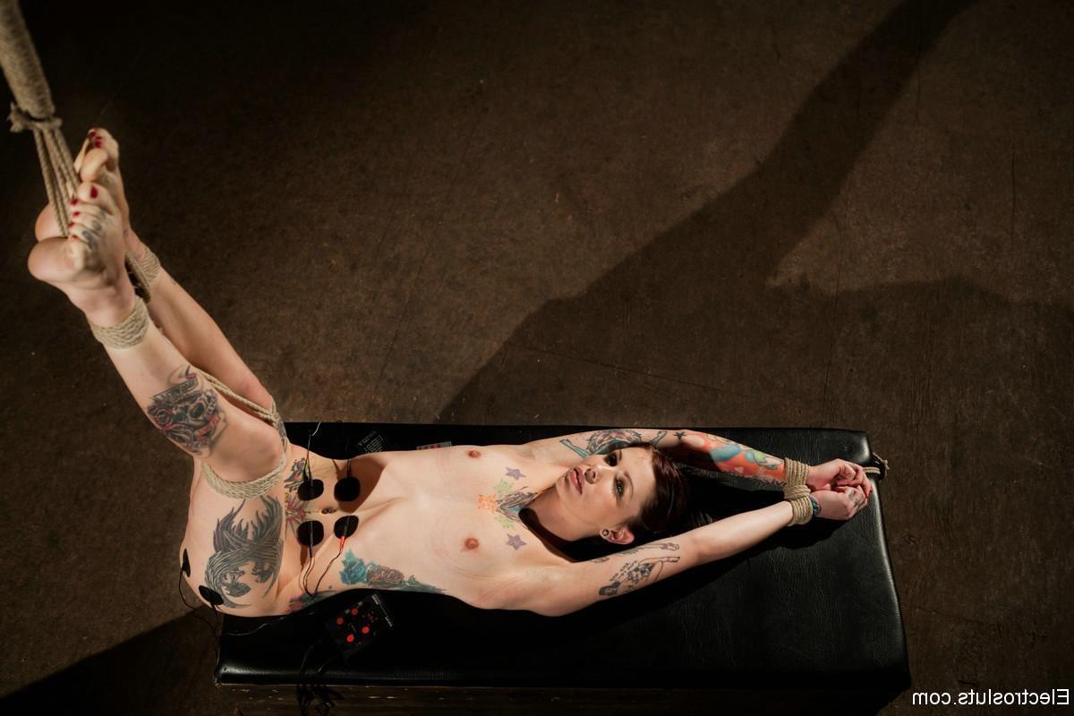 24P Tattooed babe is tied and fucked with electro strapon by lezdom