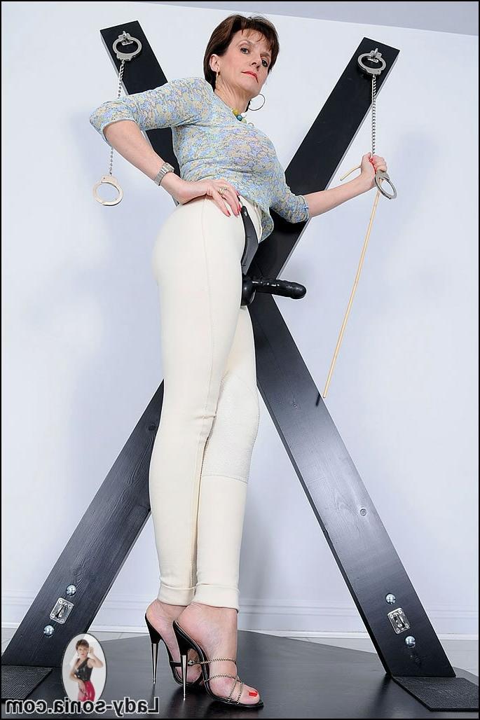 15P British mature strap on dominatrix in skintight riding jodhpurs