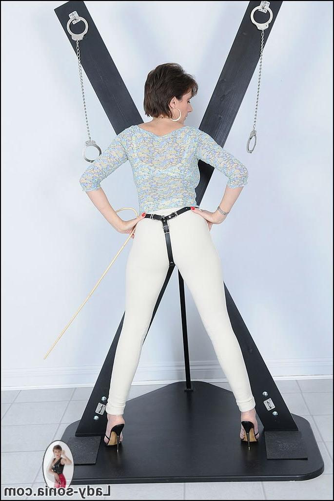 15P British mature strap on dominatrix in skintight riding jodhpurs