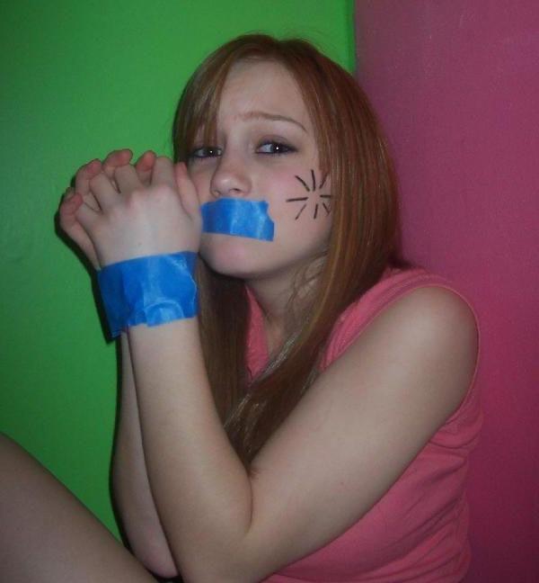 12P Cute school girl tied to a chair